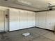 Garage featuring floor to ceiling built-in cabinets for storage at 2728 Aspen Wood Ave, Henderson, NV 89074