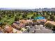 An aerial view of charming homes located on the lush green of the Las Vegas Country Club golf course at 2845 Queens Courtyard Dr, Las Vegas, NV 89109