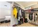 A well-organized walk-in closet at 2845 Queens Courtyard Dr, Las Vegas, NV 89109