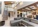 Open concept living room connected to the kitchen and dining, with high ceilings at 2845 Queens Courtyard Dr, Las Vegas, NV 89109