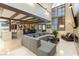 Expansive living room with an open layout flowing into the kitchen and dining area at 2845 Queens Courtyard Dr, Las Vegas, NV 89109