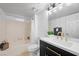 Bathroom featuring updated vanity, hardware, and a tub and shower combo at 2995 E Sunset Rd # 134, Las Vegas, NV 89120