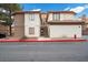 Two-story building features well-maintained landscaping, easy access to stairs, and neutral colors at 2995 E Sunset Rd # 134, Las Vegas, NV 89120