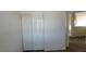 A room with white walls and baseboards features a closet with standard double doors at 3021 New Journey Way, North Las Vegas, NV 89031