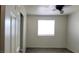 A bright bedroom with natural light and a ceiling fan at 3021 New Journey Way, North Las Vegas, NV 89031
