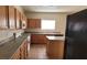 Functional kitchen with neutral counters, island, and standard appliances for everyday meal preparation at 3021 New Journey Way, North Las Vegas, NV 89031