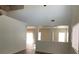 Open-concept living space with ample natural light and neutral color palette at 3021 New Journey Way, North Las Vegas, NV 89031