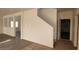Spacious living room shows a stairway and doorway to another room for maximum utility at 3021 New Journey Way, North Las Vegas, NV 89031