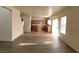Open concept living area flows into the kitchen with tile flooring at 3021 New Journey Way, North Las Vegas, NV 89031