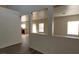 Spacious living area, connecting to the kitchen through an open layout at 3021 New Journey Way, North Las Vegas, NV 89031