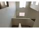 View of a tall staircase and hallway from the second story at 3021 New Journey Way, North Las Vegas, NV 89031