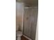 A bathroom features a toilet and an enclosed shower with a sliding glass door at 3125 N Buffalo Dr # 2104, Las Vegas, NV 89128