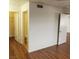 A bright interior hallway leads past a half-bath and into the home at 3125 N Buffalo Dr # 2104, Las Vegas, NV 89128