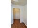 An interior view of a walk-in closet boasts bright paint and shelving at 3125 N Buffalo Dr # 2104, Las Vegas, NV 89128