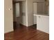 Hallway featuring hard wood floors and access to multiple rooms at 3125 N Buffalo Dr # 2104, Las Vegas, NV 89128