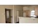 Spacious kitchen with an eat in bar, lots of storage and a view to other rooms at 3125 N Buffalo Dr # 2104, Las Vegas, NV 89128