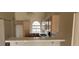 Spacious eat in kitchen with stainless steel appliances and lots of natural light at 3125 N Buffalo Dr # 2104, Las Vegas, NV 89128
