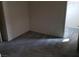 Carpeted bedroom featuring neutral paint, base trim, and light fixture at 3644 Starlight Evening St, Las Vegas, NV 89129