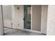 Patio featuring a sliding glass door entry, screen, and partial wall at 3644 Starlight Evening St, Las Vegas, NV 89129