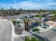 Aerial view of the property showcasing lush landscaping and mature palm trees at 3647 Ottawa Cir, Las Vegas, NV 89169