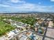 Expansive aerial view showcasing the community, golf course, and mountain views at 3647 Ottawa Cir, Las Vegas, NV 89169