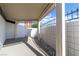 Covered patio with rock landscaping and privacy fence at 3647 Ottawa Cir, Las Vegas, NV 89169