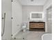 Modern bathroom featuring a double sink vanity and glass enclosed shower at 3647 Ottawa Cir, Las Vegas, NV 89169