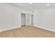 Spacious bedroom featuring updated flooring, closet with sliding doors, and updated interior doors at 3647 Ottawa Cir, Las Vegas, NV 89169