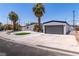 Well-maintained home with desert landscaping and a detached garage, enhancing curb appeal at 3647 Ottawa Cir, Las Vegas, NV 89169