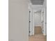 Bright hallway featuring modern flooring and neutral paint, creating a seamless transition between rooms at 3647 Ottawa Cir, Las Vegas, NV 89169