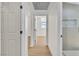 Hallway features wood-look floors and leads to a modern bathroom at 3647 Ottawa Cir, Las Vegas, NV 89169