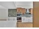 Stylish kitchen with contemporary cabinets, tiled backsplash, and stainless steel appliances at 3647 Ottawa Cir, Las Vegas, NV 89169