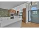 Modern kitchen featuring white cabinets, stainless steel appliances, and a large island at 3647 Ottawa Cir, Las Vegas, NV 89169