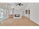 Open floor plan living room featuring modern lighting, fireplace, and access to pool at 3647 Ottawa Cir, Las Vegas, NV 89169