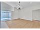 Open living room with access to the pool area, featuring modern lighting at 3647 Ottawa Cir, Las Vegas, NV 89169