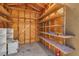 Interior view of shed featuring open wood shelves at 3647 Ottawa Cir, Las Vegas, NV 89169