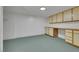 Partially finished basement with built-in cabinets and counters, flexible for various activities or storage at 415 Emerald Cir, Henderson, NV 89002