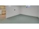 Versatile basement space with carpet flooring, ready for customization or simple storage solutions at 415 Emerald Cir, Henderson, NV 89002