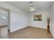 Spare bedroom features wood-look floors, a ceiling fan, and is ready for your personal touch at 415 Emerald Cir, Henderson, NV 89002
