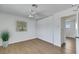Inviting bedroom with wood-look flooring, a ceiling fan, and a large closet for ample storage at 415 Emerald Cir, Henderson, NV 89002