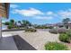 A view of the street with a xeriscaped yard at 415 Emerald Cir, Henderson, NV 89002