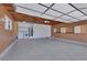 Spacious garage with laundry, storage, epoxy floor, and high ceilings at 415 Emerald Cir, Henderson, NV 89002