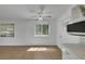 Bright kitchen features white cabinets and a large window, creating a welcoming space at 415 Emerald Cir, Henderson, NV 89002
