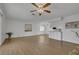 Spacious living room showcasing neutral tones, wood-look floors, and natural light, ready for personalized touches at 415 Emerald Cir, Henderson, NV 89002