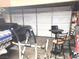 Garage with car, tools, and an assortment of chairs and tables at 508 Tara Ct, Boulder City, NV 89005