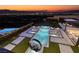 This backyard offers a gorgeous view, a pool, spa, and built-in kitchen at 523 Overlook Rim Dr, Henderson, NV 89012