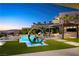 This backyard features a pool, built-in seating, and a gorgeous view at 523 Overlook Rim Dr, Henderson, NV 89012