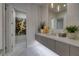 Modern bathroom featuring a double sink vanity, contemporary fixtures, and stylish design for a luxurious experience at 523 Overlook Rim Dr, Henderson, NV 89012