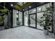 Grand entrance featuring expansive glass walls, allowing natural light to illuminate the modern interior at 523 Overlook Rim Dr, Henderson, NV 89012