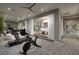 Well-equipped gym featuring modern exercise equipment, mirrored walls, and ample space for a complete workout at 523 Overlook Rim Dr, Henderson, NV 89012